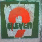 AU Melbourne 711 logo 9-11